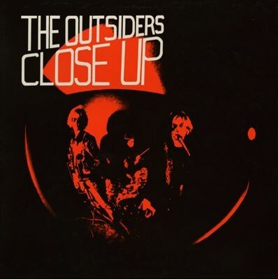 OUTSIDERS, close up cover