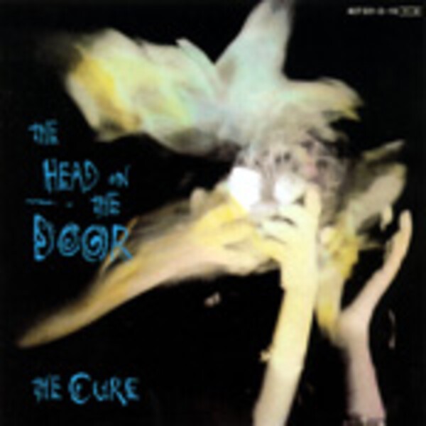 CURE, head on the door cover