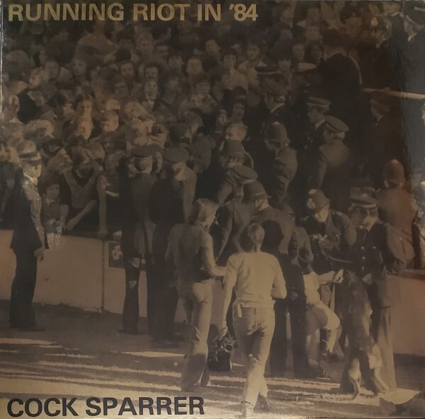 Cover COCK SPARRER, running in riot ´84 (gold foil sleeve)
